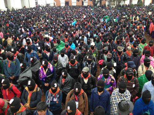 Zapatistas march on San Cristóbal de las casas. Photo by Victor Camacho.