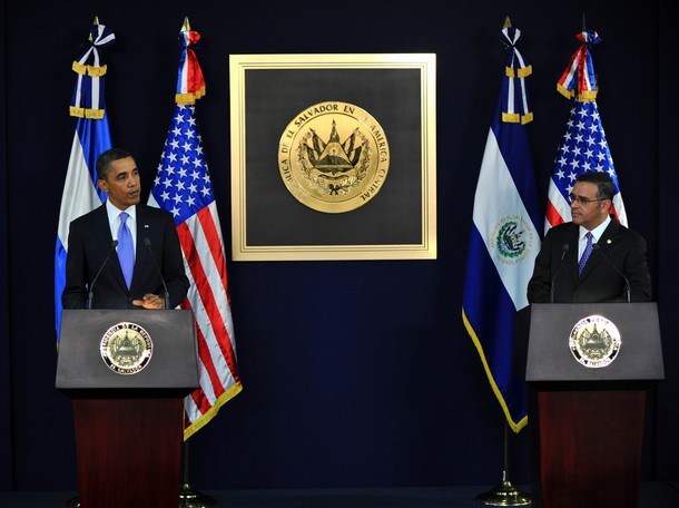 US president Barack Obama (L) speaks nex