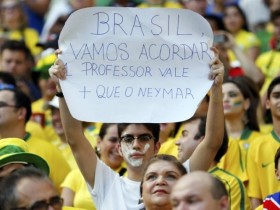 Sing reads "Brazil Wake Up, Teachers are Worth More than Neymar"