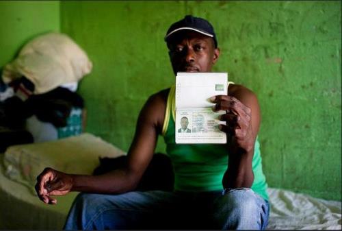 Haitian Migrant with passport